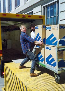 Brett Ratcliffe carring boxes